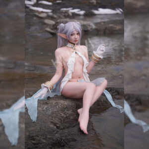 @DISHWASHER1910 Frieren elf cosplay: gold and white costume with delicate chains, long cape, elf ears and leg rings from Sousou no Frieren
